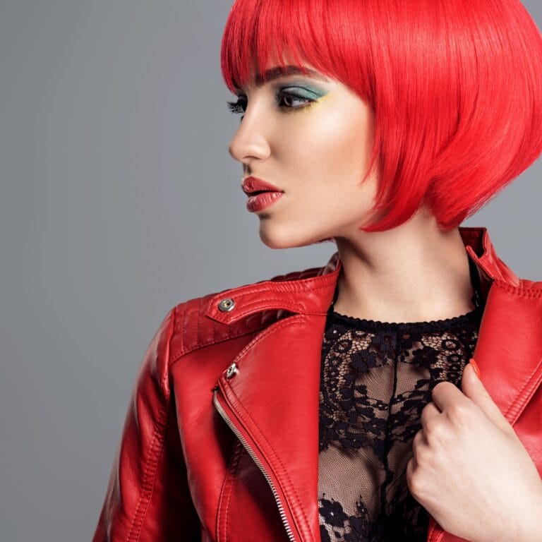 Beautiful sexy woman with bright red bob hairstyle.